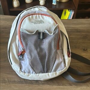The NORTHFACE TNF grey MINI unisex zip padded BACKPACK adjustable straps…